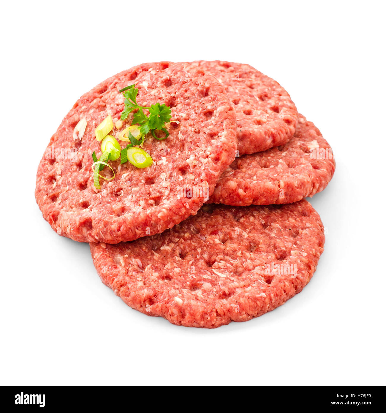 Vier Rindfleisch Hamburger mit Gewürz Kräuter, isoliert Stockfoto