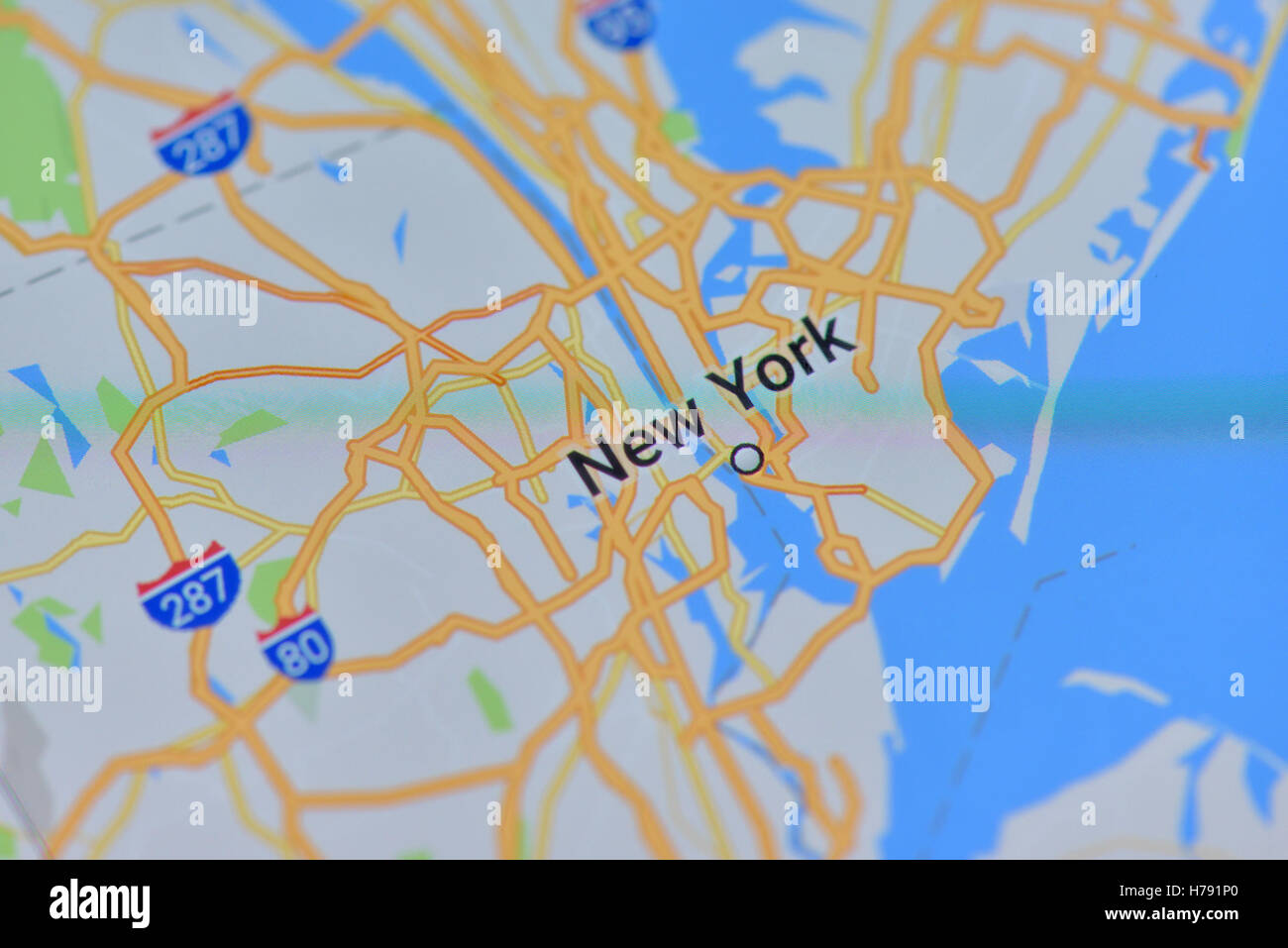 Nahaufnahme einer digitalen Karte von New York City auf einem Smartphone-display Stockfoto