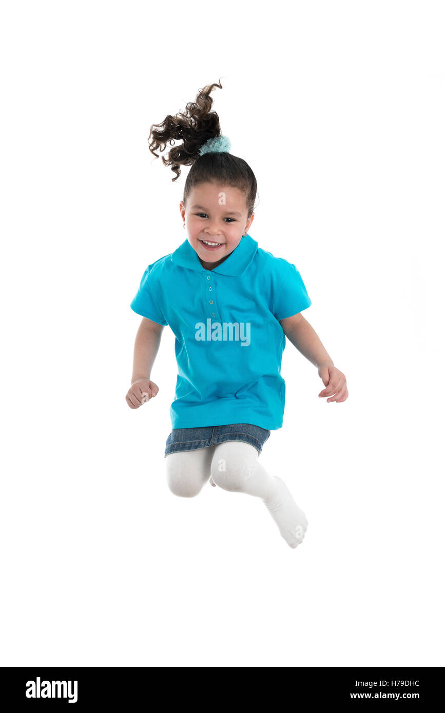 Aktive fröhliches Mädchen springen vor Freude, Isolated on White Background Stockfoto