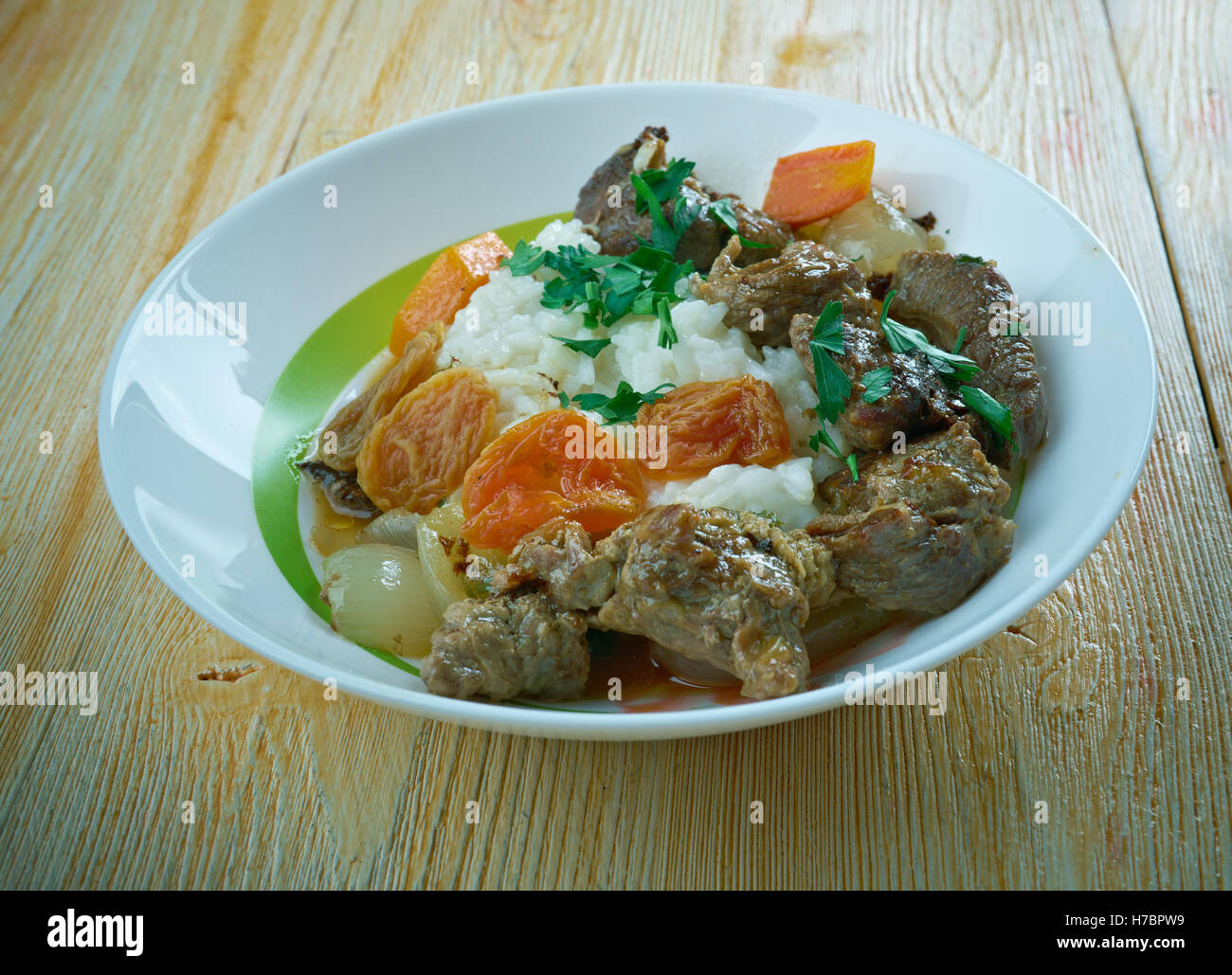 Beesvleisbredie - deutsches Rindfleisch-Eintopf mit Reis Stockfoto