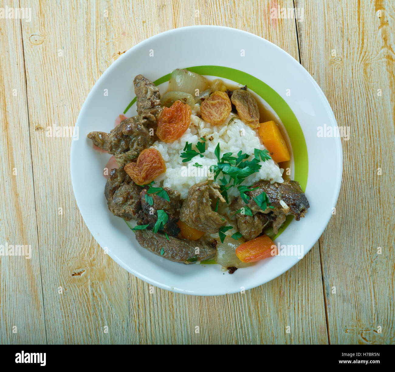 Beesvleisbredie - deutsches Rindfleisch-Eintopf mit Reis Stockfoto
