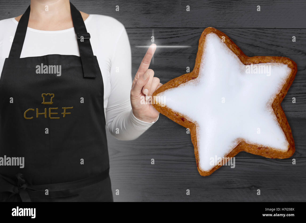 Zimt-Sterne Konzept zeigt Koch. Stockfoto