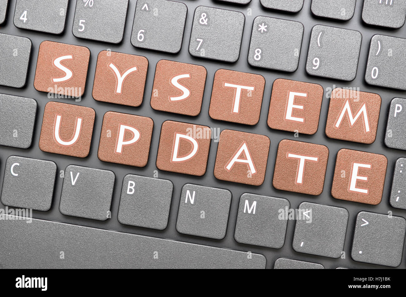 Braun System-Update-Key auf Tastatur Stockfoto