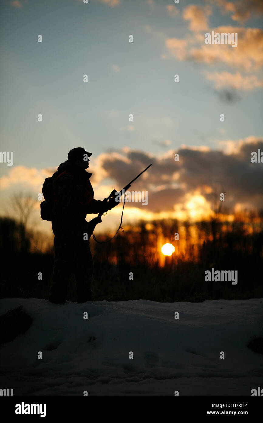 Silhouette des Big Game Hunter Stockfoto