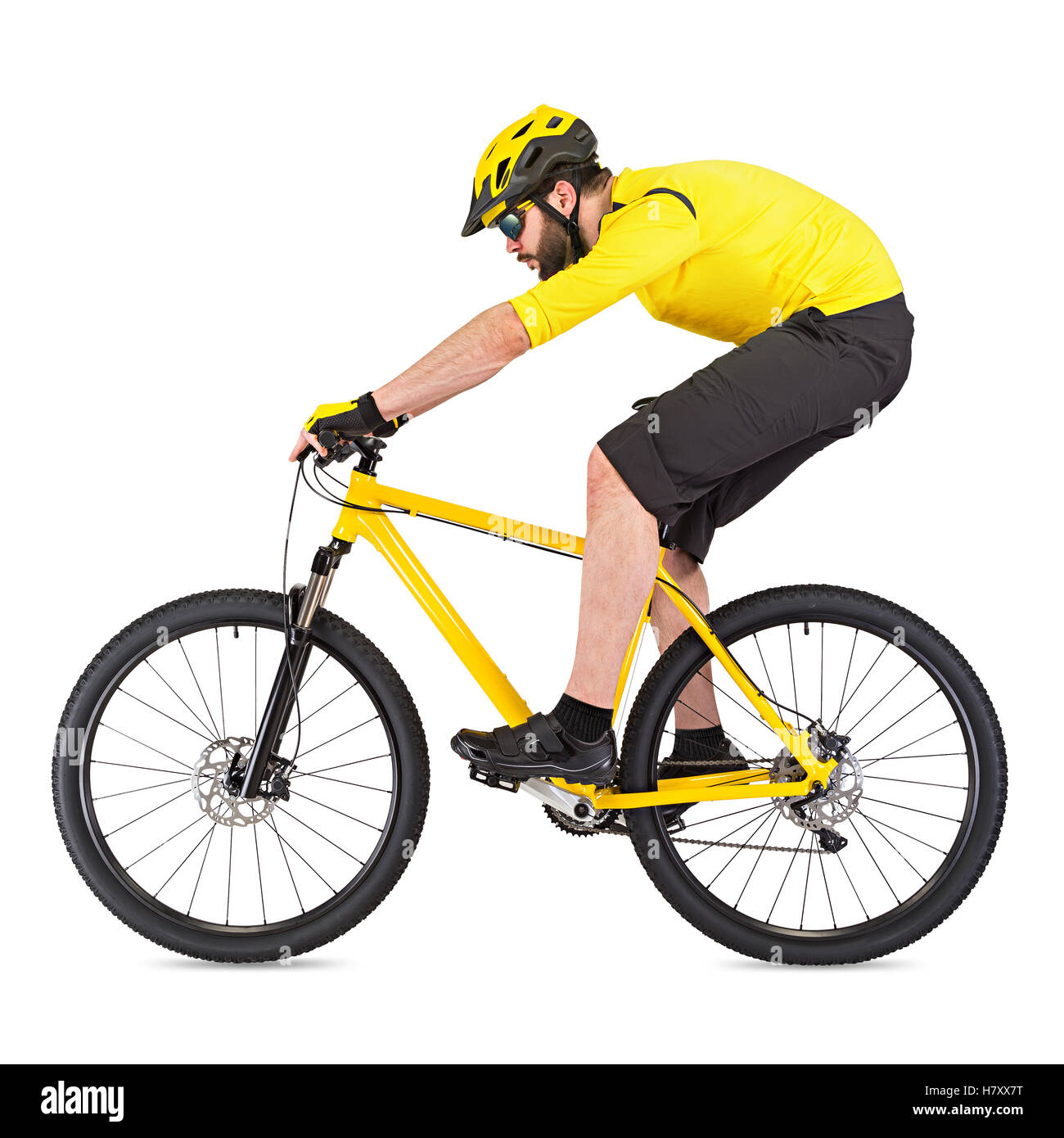 junge Radfahrer mit Bart auf gelben Mountainbike isoliert auf weißem Hintergrund Stockfoto