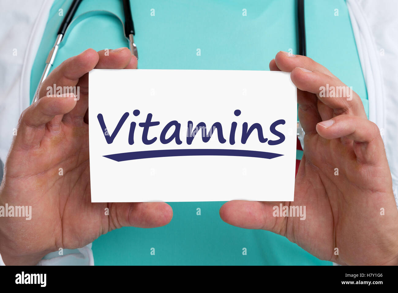 Vitamine-Vitamin gesund essen Lebensstil Arzt Gesundheit mit Schild Stockfoto