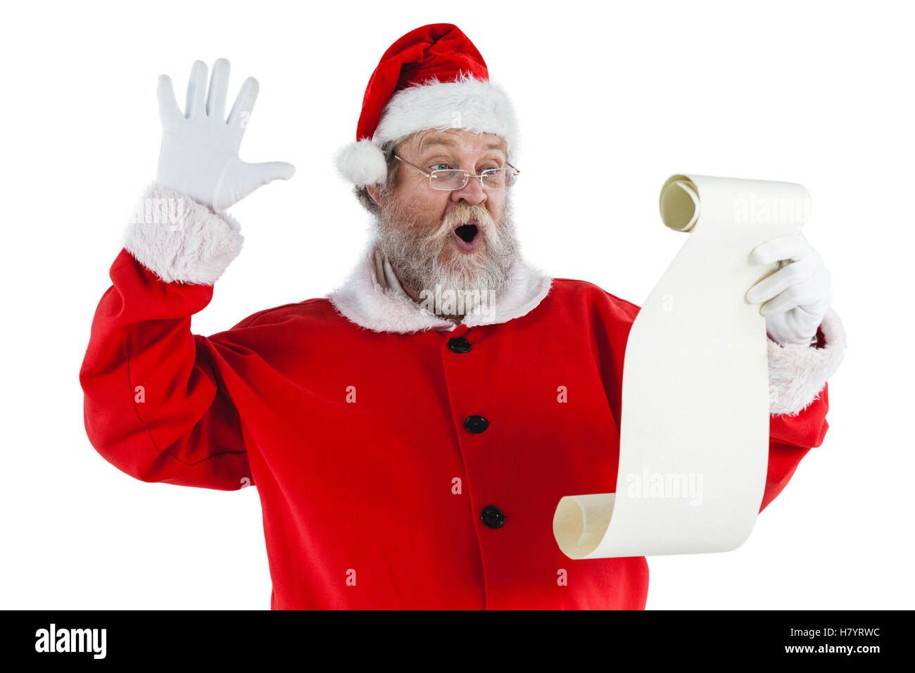 Santa Claus macht Gesichtsausdruck während des Lesens scroll Stockfoto
