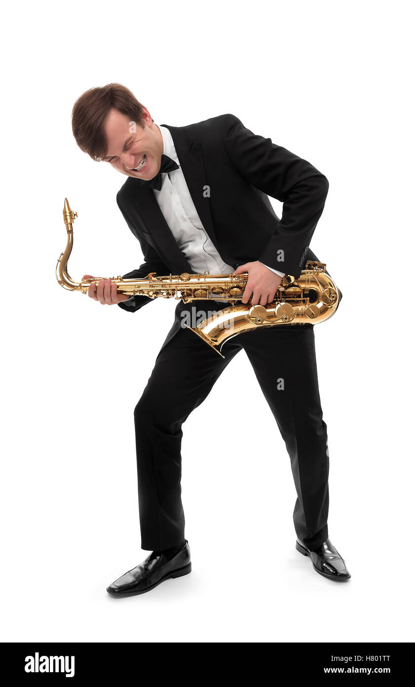 Saxophonist spielt Saxophon Hardrock mit lustigem Gesicht. Stockfoto