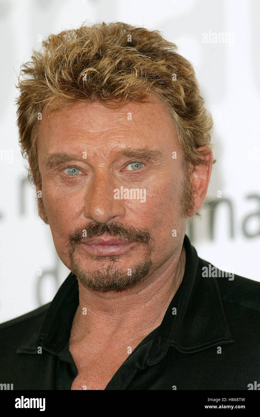 JOHNNY HALLYDAY l ' Homme DU TRAIN PHOTOCALL Venedig FILM FESTIVAL Venedig Italien 3. September 2002 Stockfoto