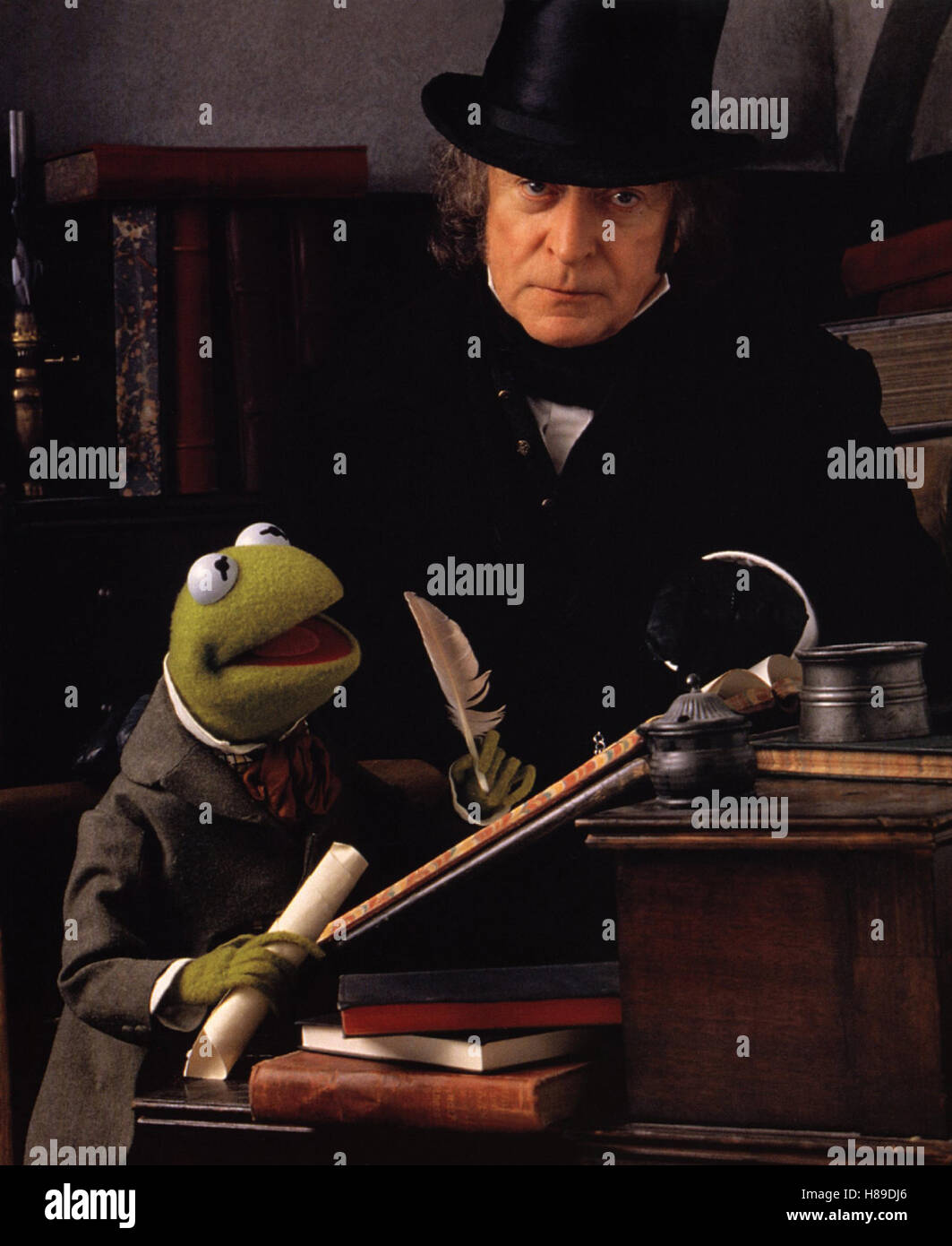 Sterben die Muppets Weihnachtsgeschichte (A MUPPETS CHRISTMAS CAROL) USA 1992, Regie: Brian Henson, KERMIT + MICHAEL CAINE, Stichwort: Zylinder, Spazierstock, Frosch, Puppe Stockfoto