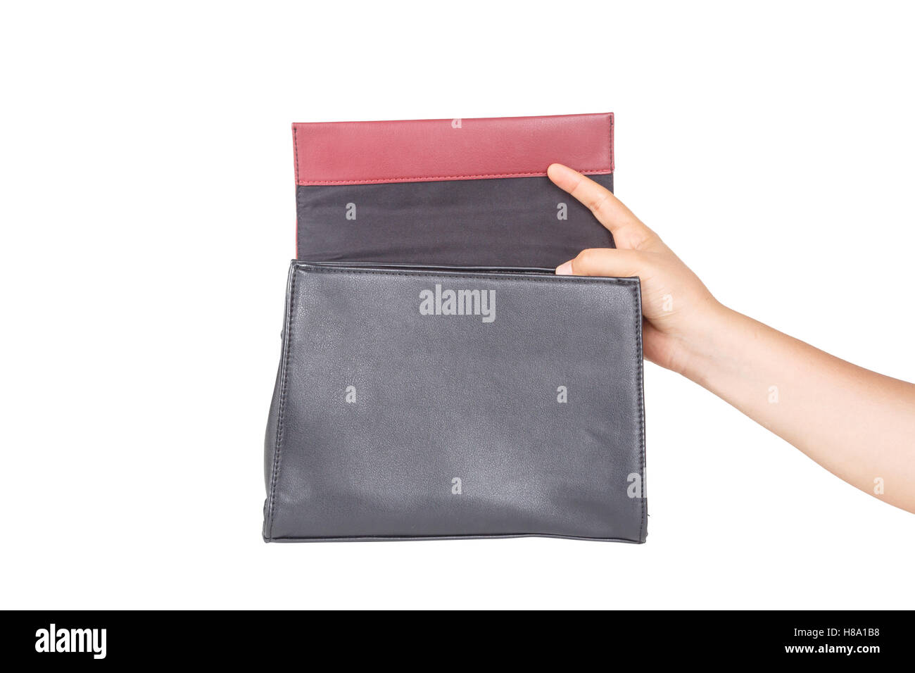 Frau Hand mit Business-Handtasche, isoliert auf weißem Hintergrund. Stockfoto