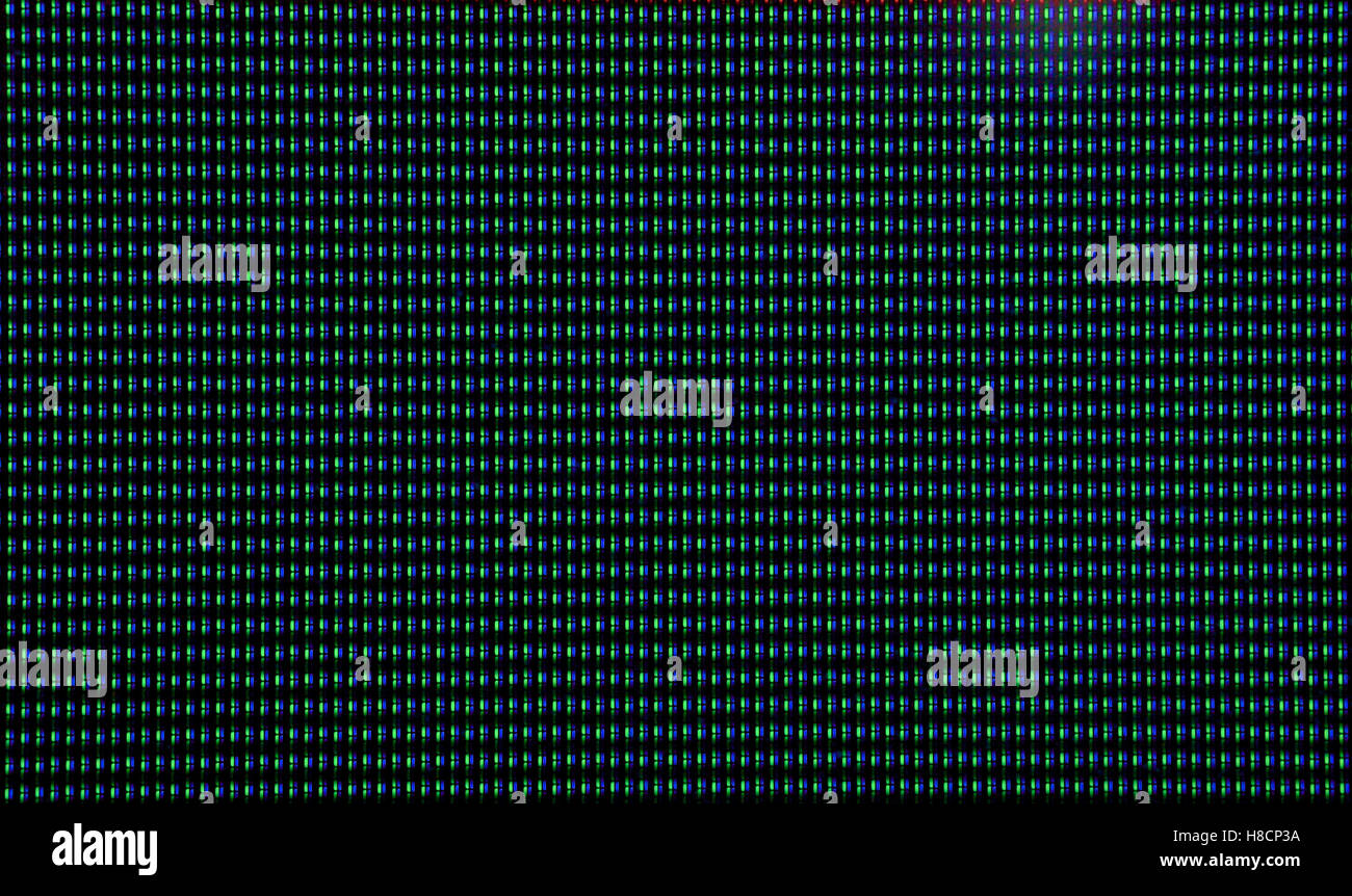 Makroaufnahme von CRT-Bildschirm mit roten und blauen Punkten. Stockfoto