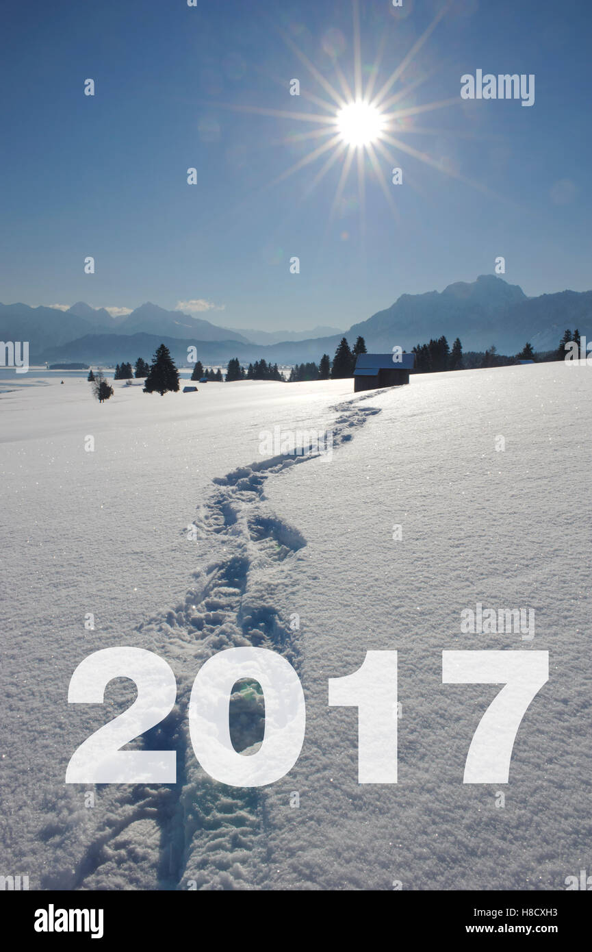 Wanderer im Schnee Sonne zu Neujahr 2017 Stockfoto