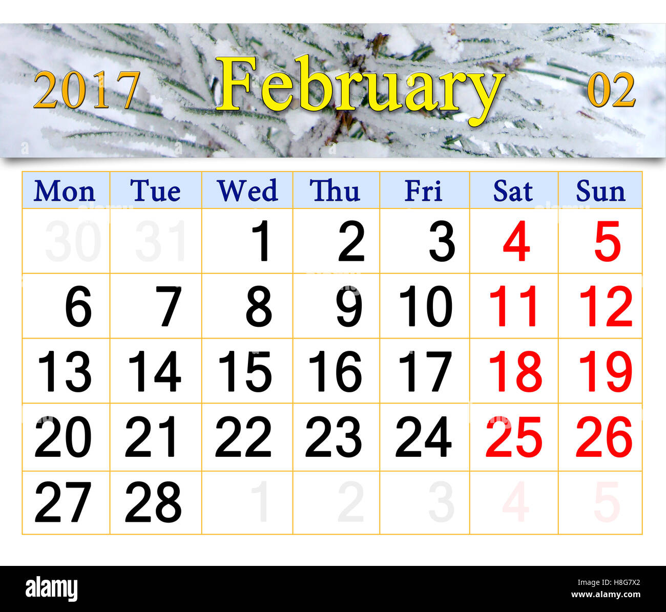 Kalender Februar 2017 mit Bild des verschneiten Tannen Stockfoto