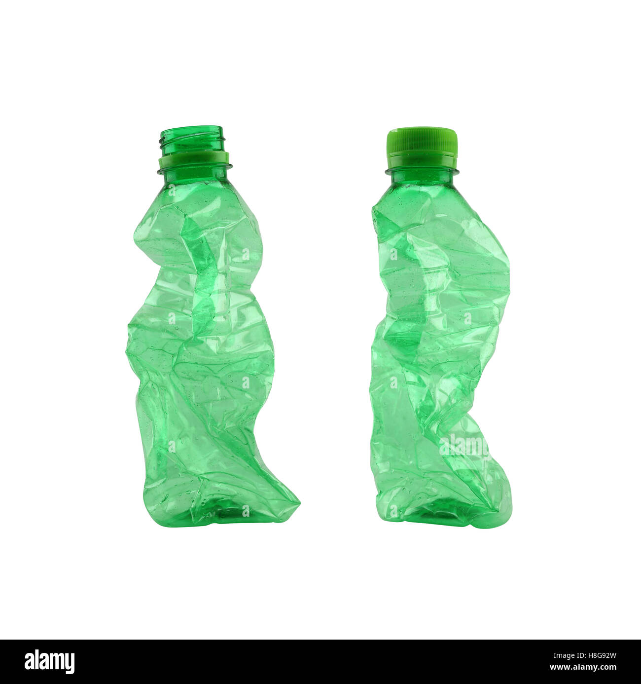 Grüne Plastikflasche isoliert auf weißem Hintergrund und haben Beschneidungspfade, einfache Bereitstellung. Stockfoto