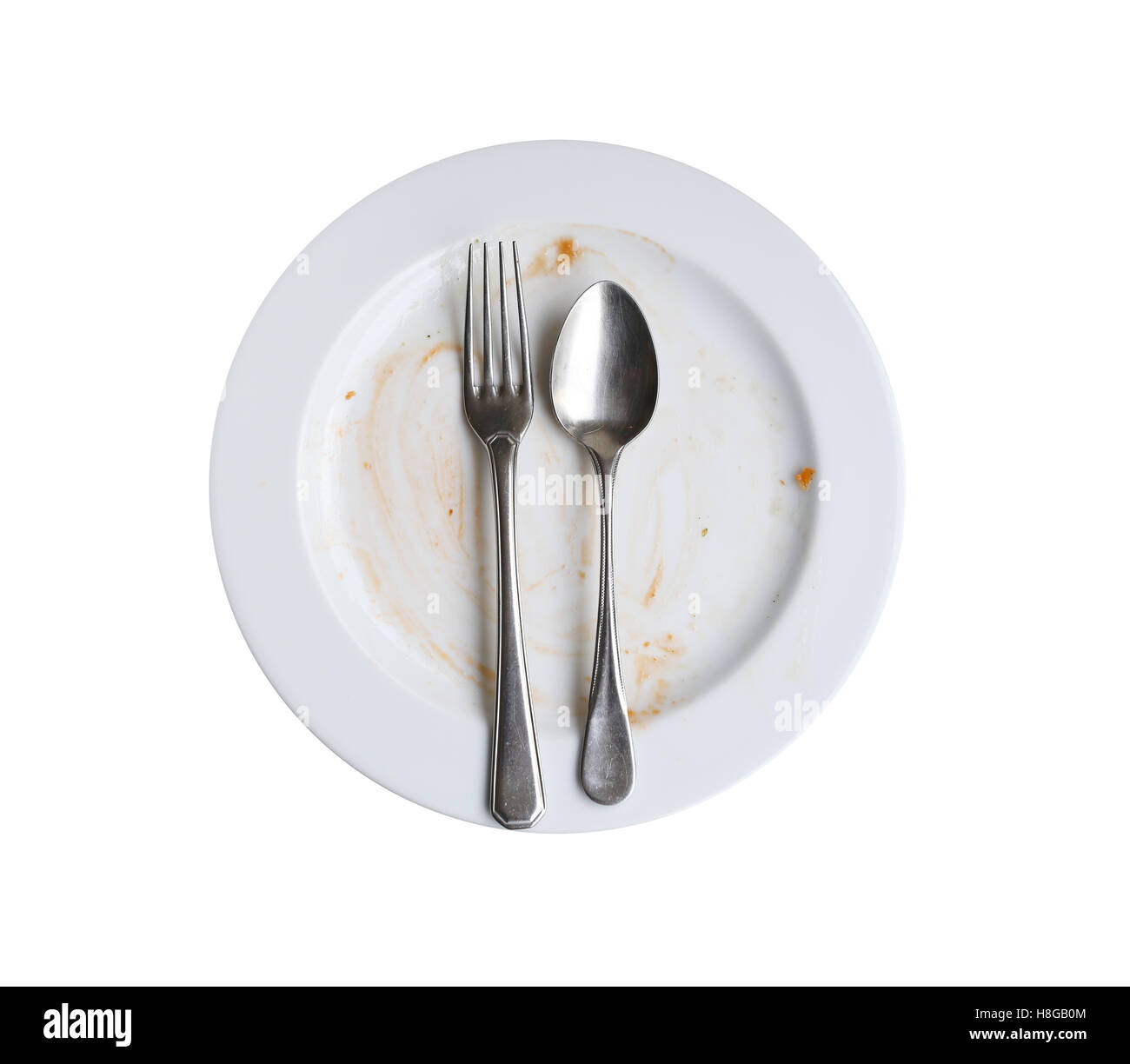 Nutzung dieser Platte nach fertigen Essen auf weißem Hintergrund isoliert. Stockfoto
