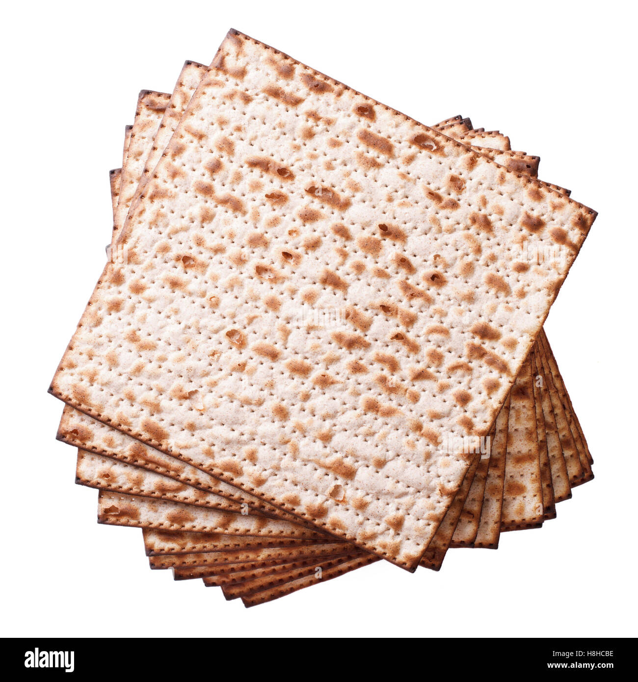 Haufen von jüdischen Matzo Fladenbrot isoliert auf weißem Hintergrund, Ansicht von oben Stockfoto