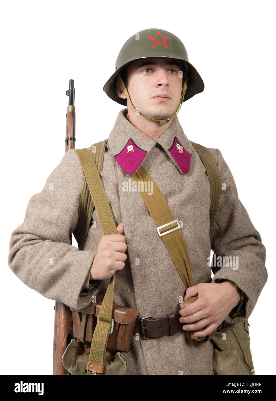 junger sowjetischer Soldat mit Winter Uniform, dem zweiten Weltkrieg auf dem weißen Hintergrund isoliert Stockfoto