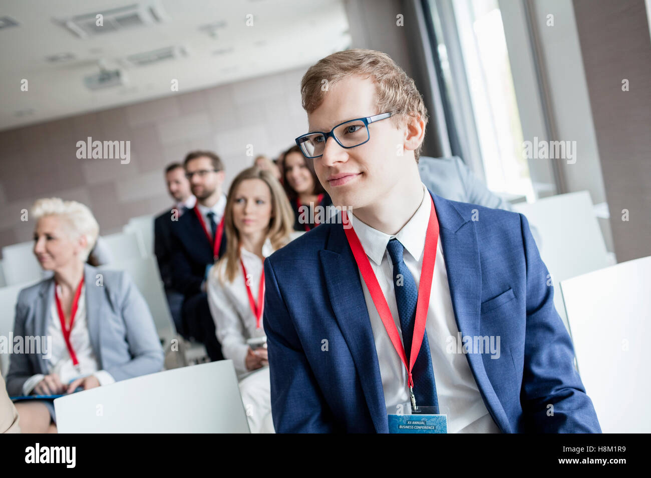 Geschäftsmann Teilnahme an Seminar im Convention center Stockfoto