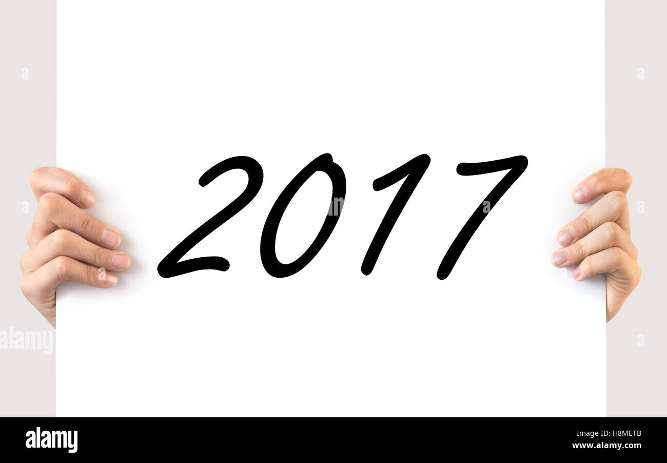 Hände halten eine weiße Tafel 2017 Stockfoto