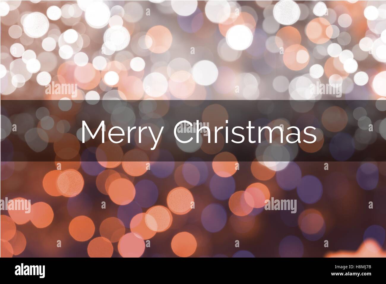 Weihnachtsbotschaft auf unscharfen Hintergrunddesign Stockfoto