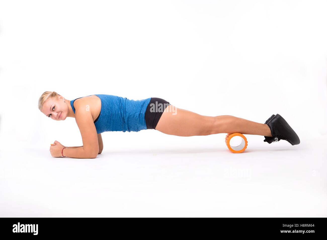 Fitness-Frau training isolierten auf weißen Hintergrund Stockfoto