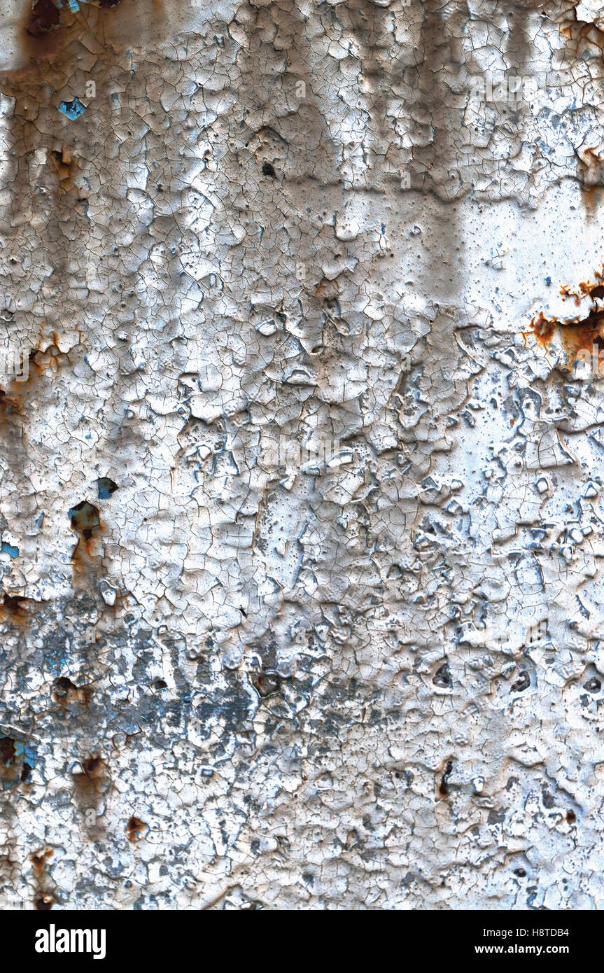 Alte alte verwitterte Grunge Rost Farbe-Peel rostigen Metall Textur, detaillierte vertikale Makro Nahaufnahme, natürliche verrosteten strukturierte Maserung Stockfoto
