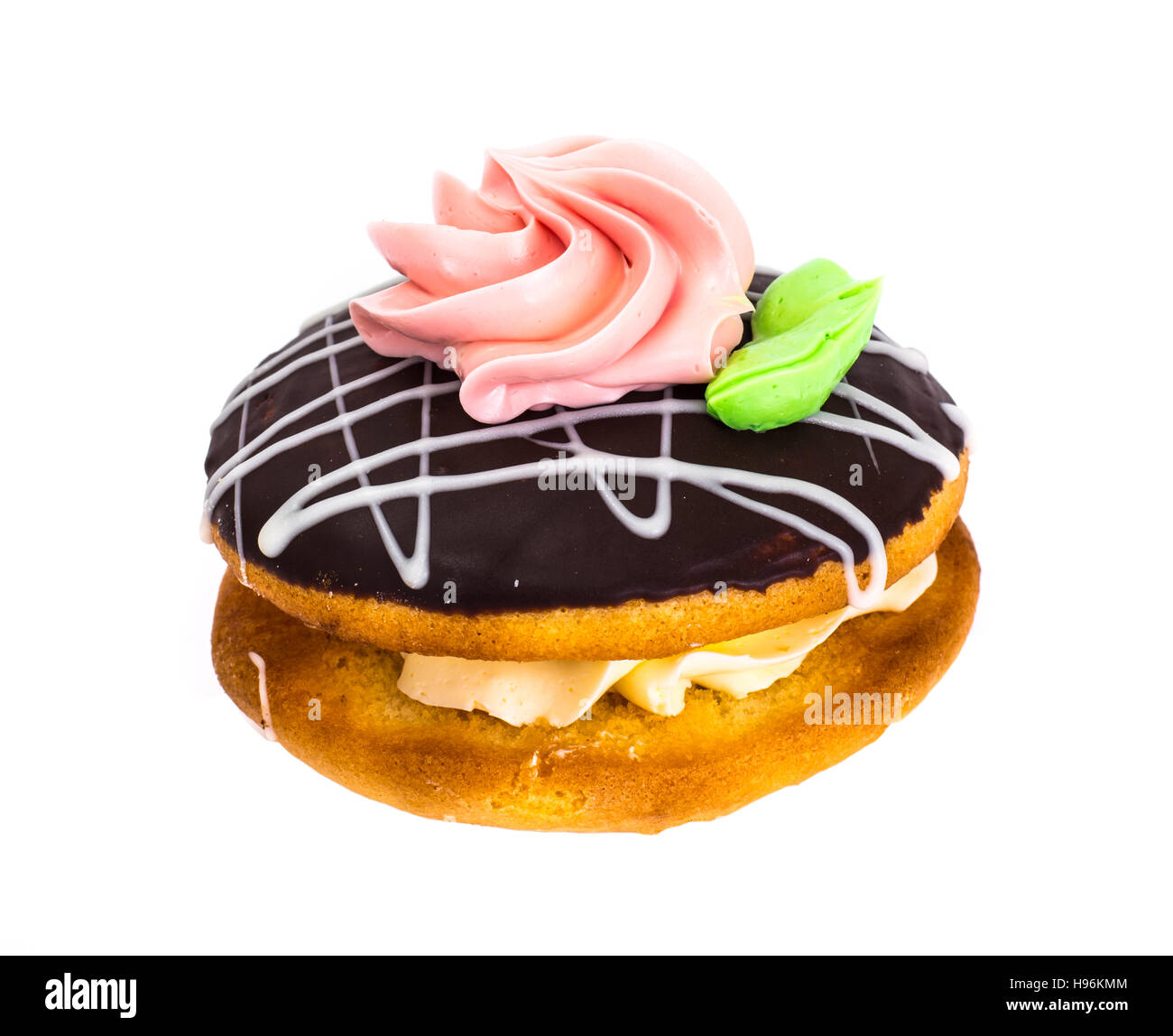 Bunte Kekse Kuchen Busch mit Sahnehäubchen und Creme-Füllung. Studio Photo Stockfoto