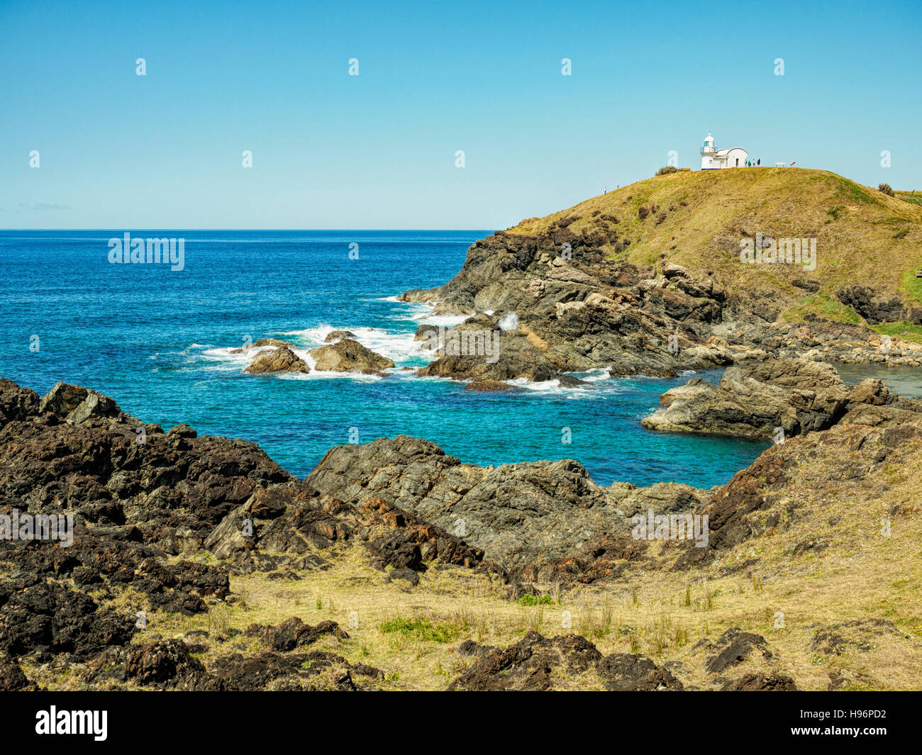 Australien, New South Wales, Port Macquarie Lighthouse auf felsigen Mantel Stockfoto