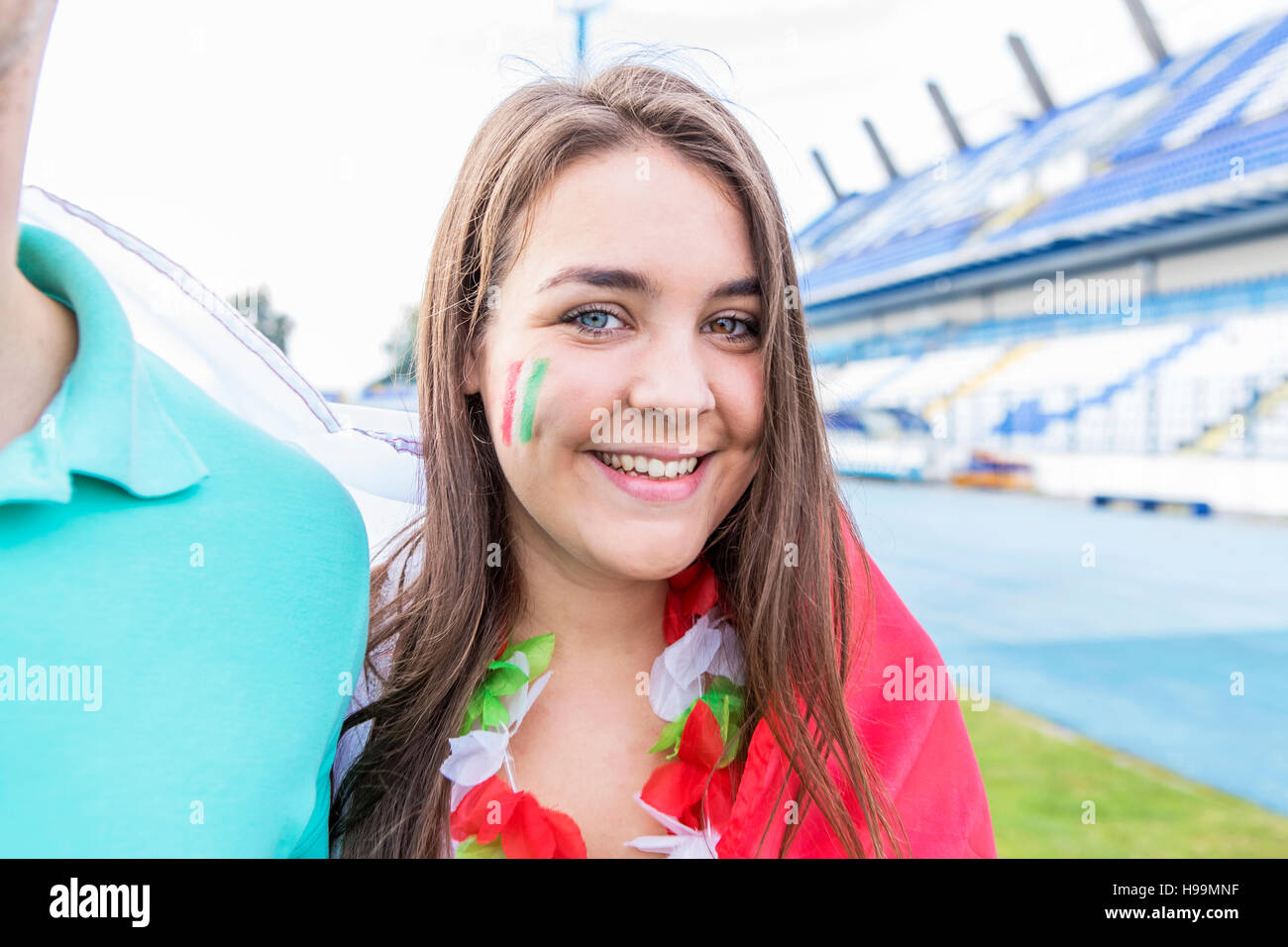 Porträt von Fußball-Fans mit Bemalung Stockfoto