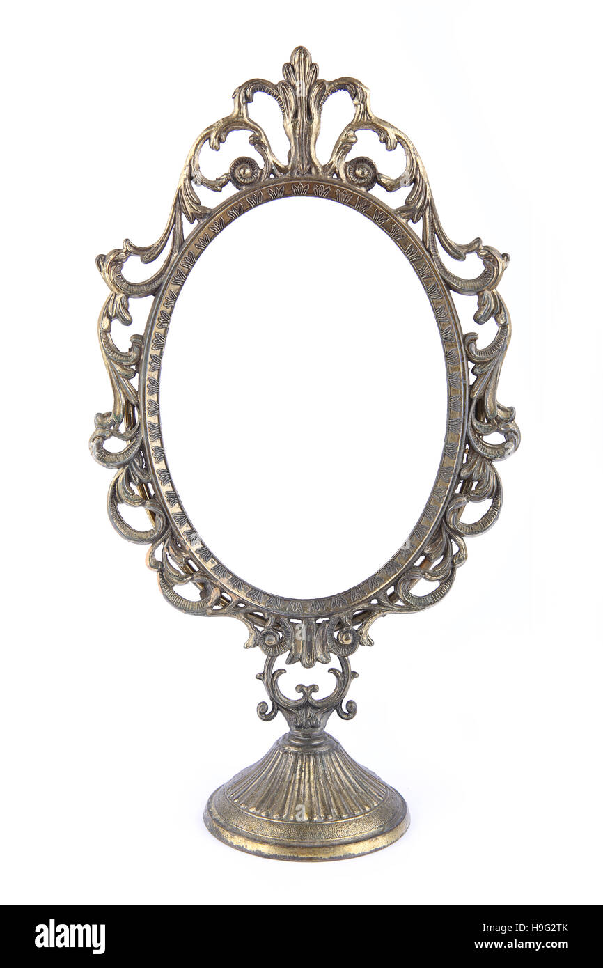 Vintage Metall Oval Spiegelrahmen isoliert auf weißem Hintergrund Stockfoto