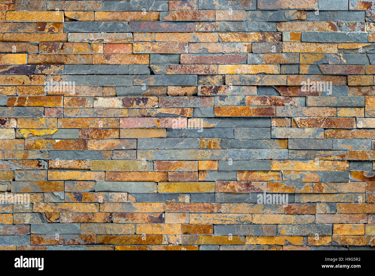 Textur des grauen bunten Schiefer Stein Felsen Hintergrund Stockfoto