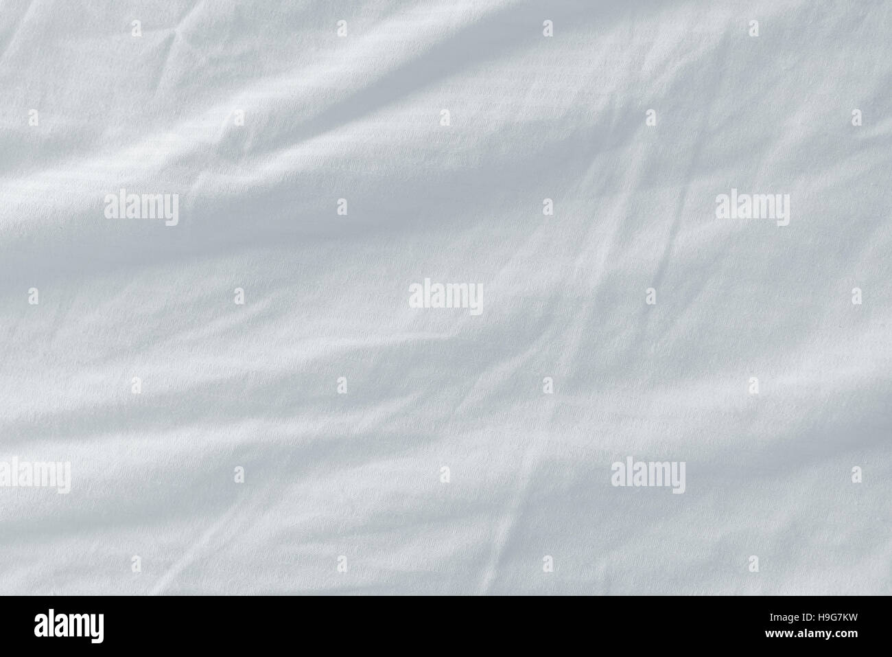 Bett Bettwäsche Textur, saubere weiße zerknitterten Baumwolle Materialoberfläche verwendet Stockfoto