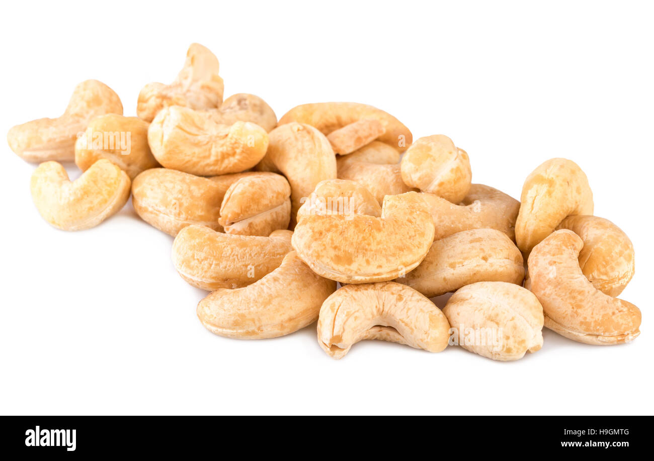 Cashew-Nüssen heap Handvoll auf weiß Stockfoto