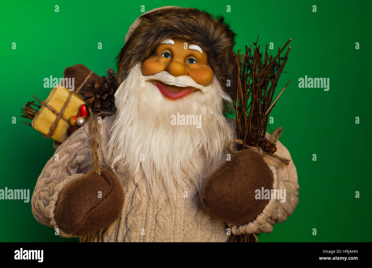 Santa Claus Oberkörper hautnah mit grünem Hintergrund. Stockfoto