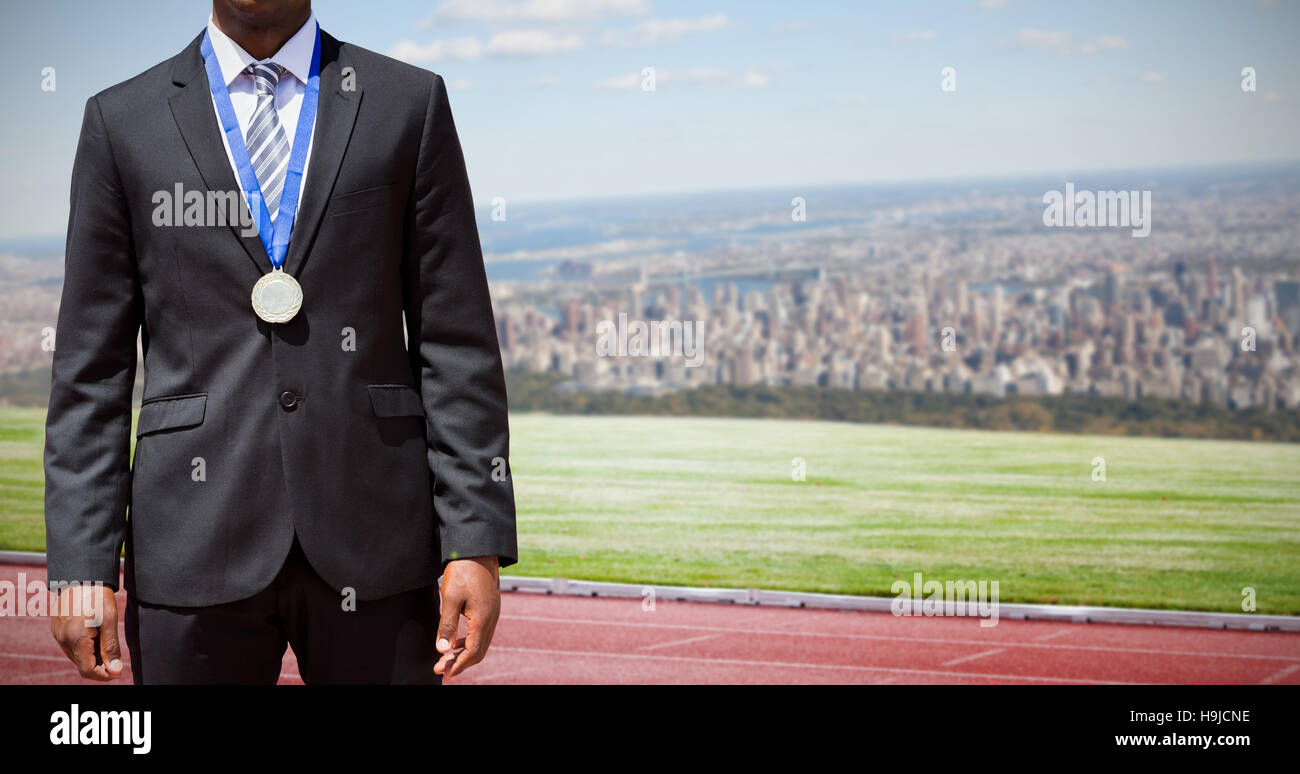 Zusammengesetztes Bild der Geschäftsmann mit Medaille Stockfoto