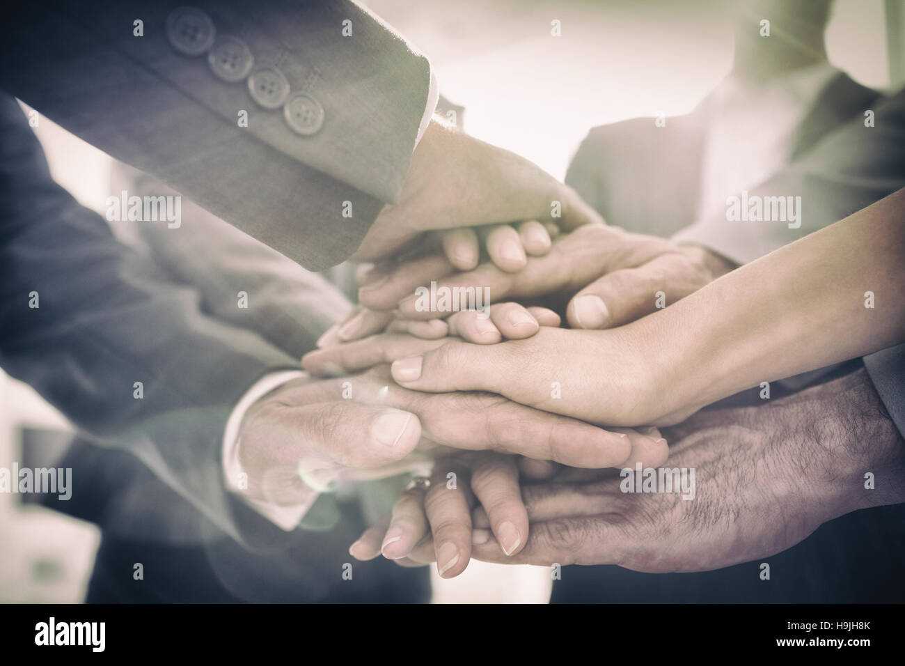 Business-Team zusammenstehen Hände Stockfoto