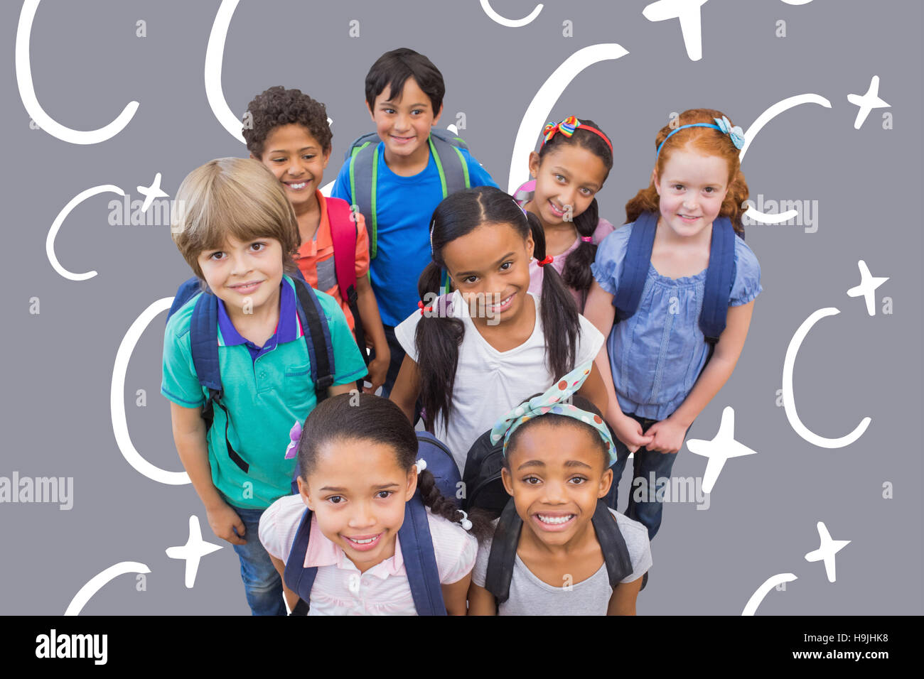 Zusammengesetztes Bild des Lächelns Schüler im Klassenzimmer Stockfoto