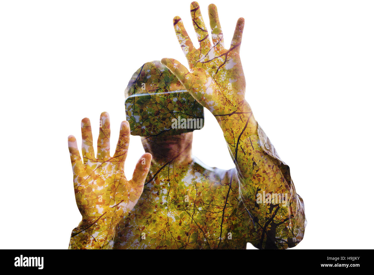 Zusammengesetztes Bild des Mannes mit einem virtual-Reality-Gerät Stockfoto