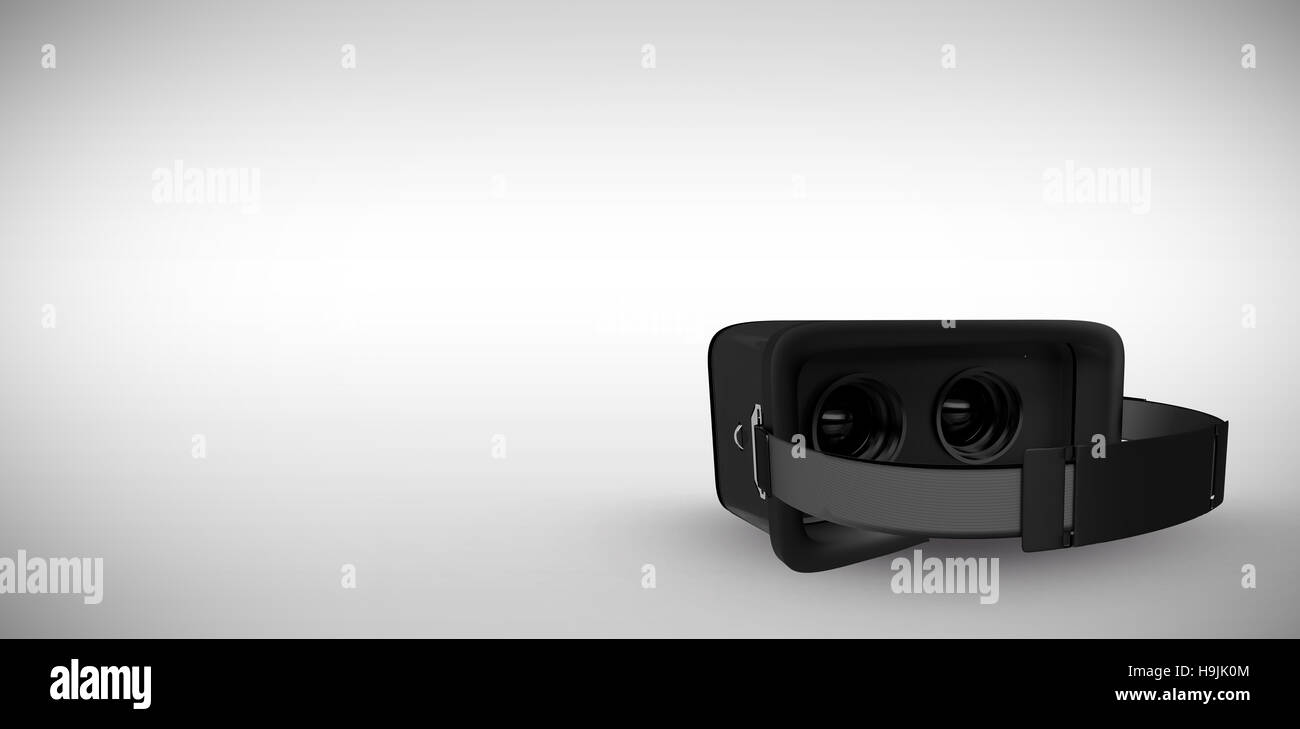 Zusammengesetztes Bild des schwarzen virtual-Reality-Simulator auf weißem Hintergrund Stockfoto