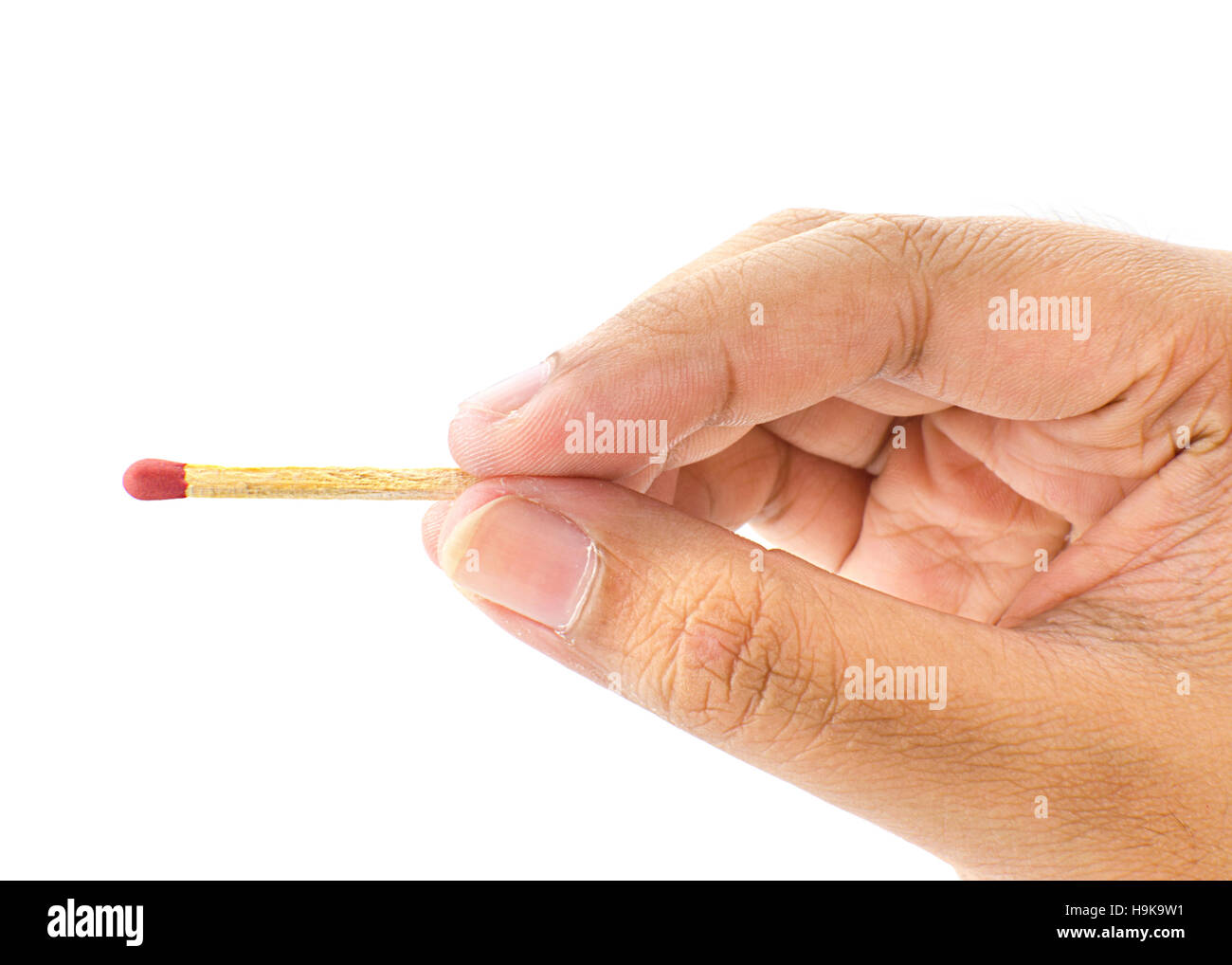 Hand mit einem feuerte Streichholz auf weißem Hintergrund Stockfoto