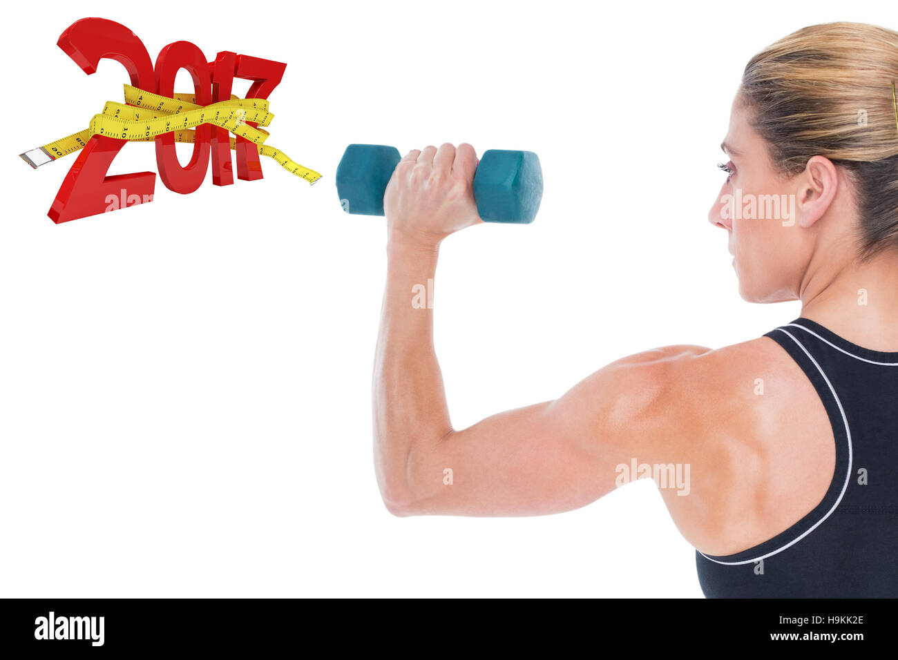 3D zusammengesetztes Bild des weiblichen Bodybuilder hält eine blaue Hantel Stockfoto