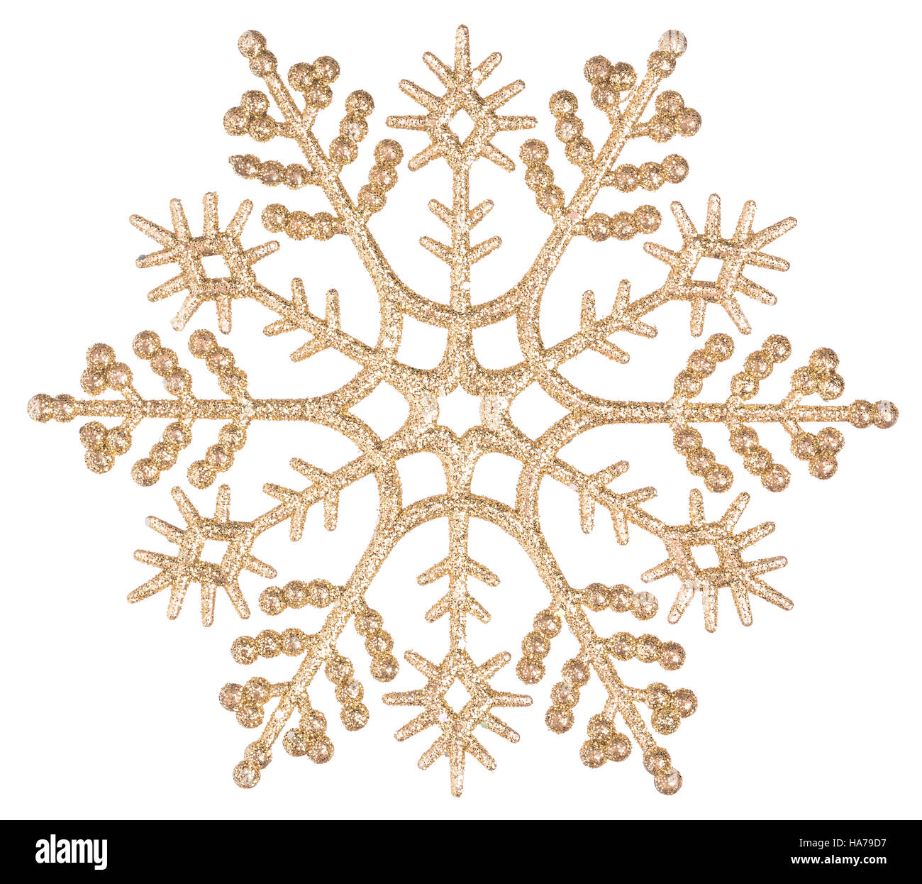 Der wunderschöne goldene Schneeflocke auf weißem Hintergrund isoliert. Element für Design Stockfoto