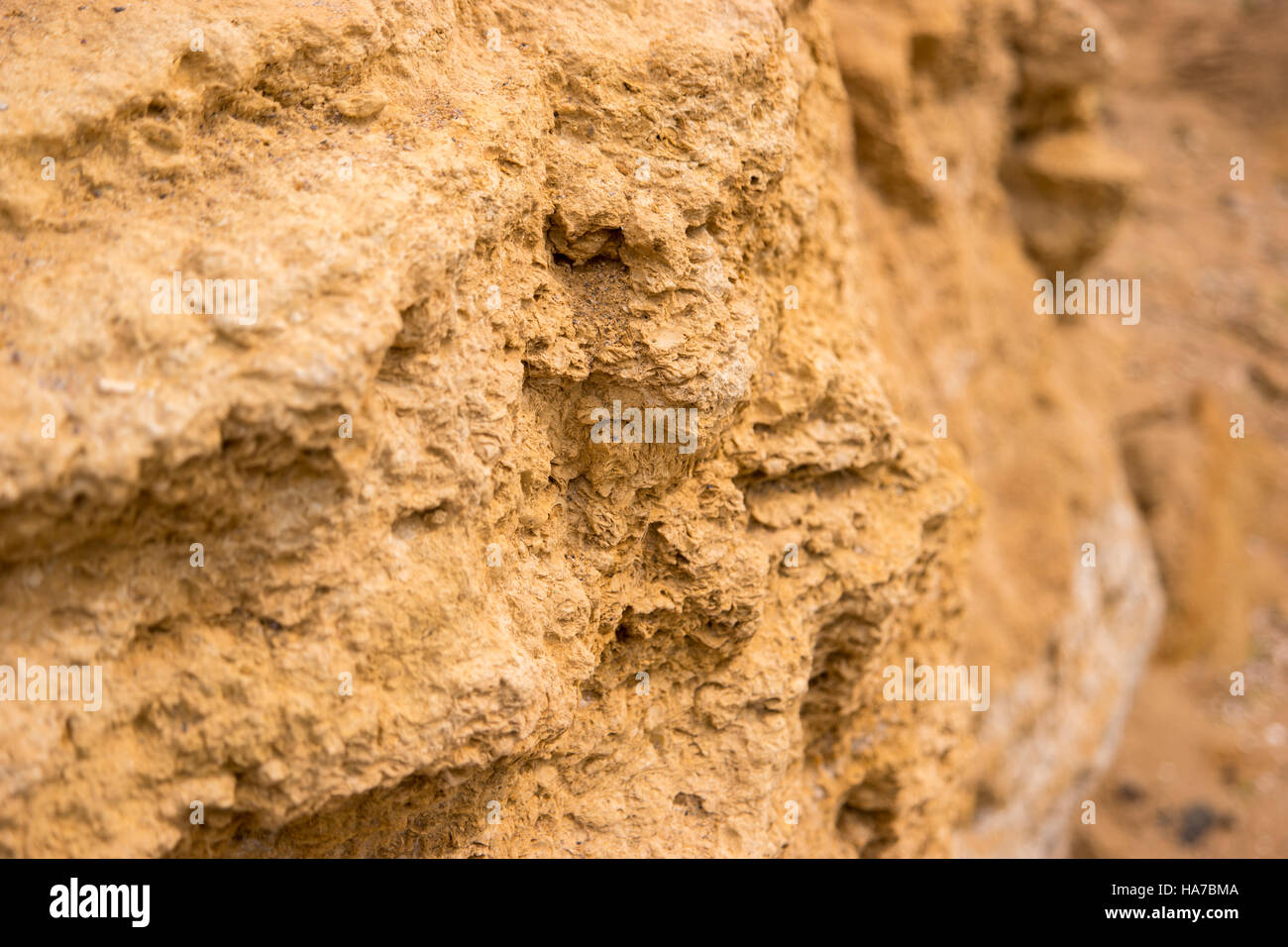 Textur des gelben Felsen. Stockfoto