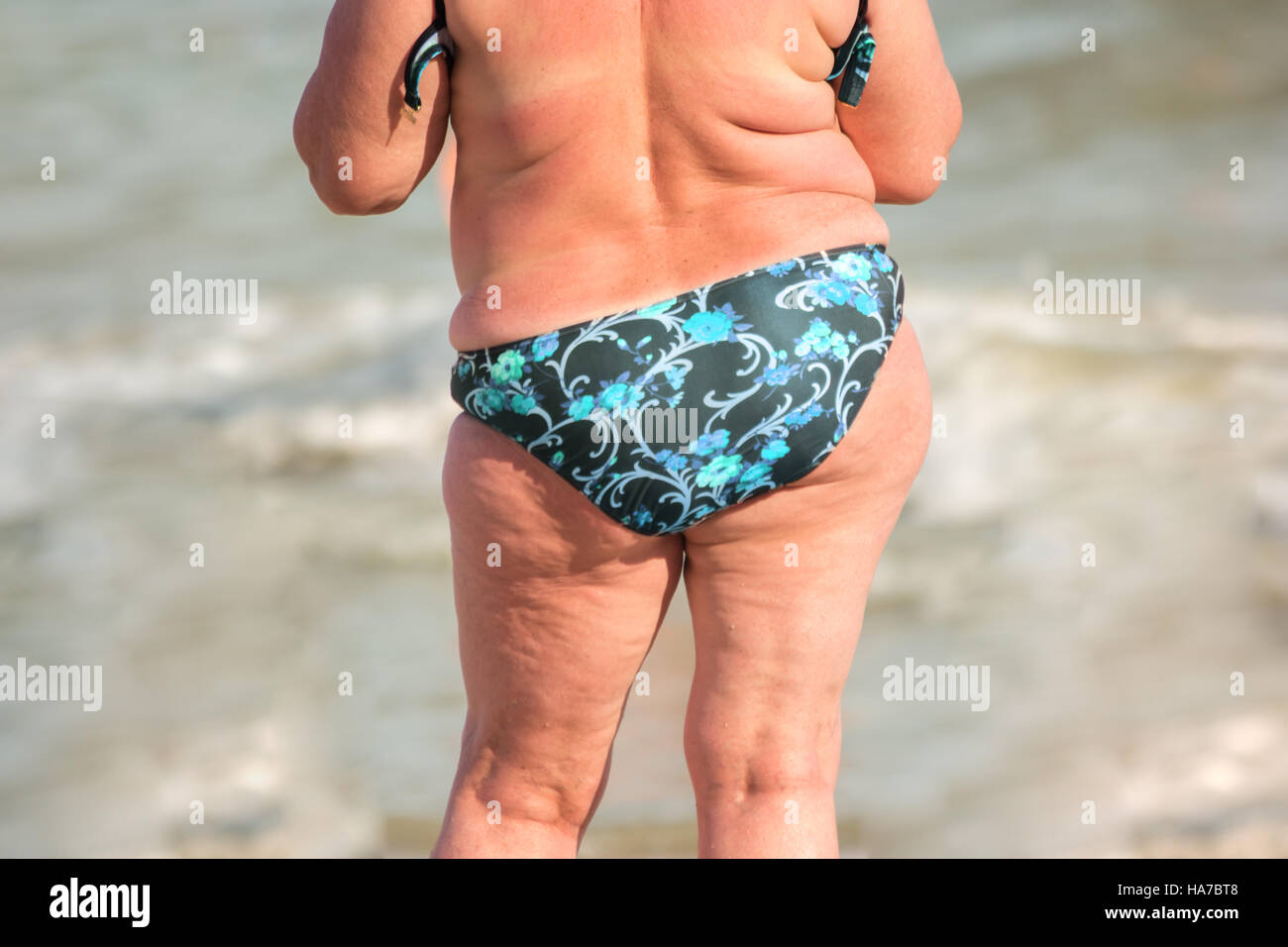 Rückansicht der übergewichtigen Frau. Stockfoto