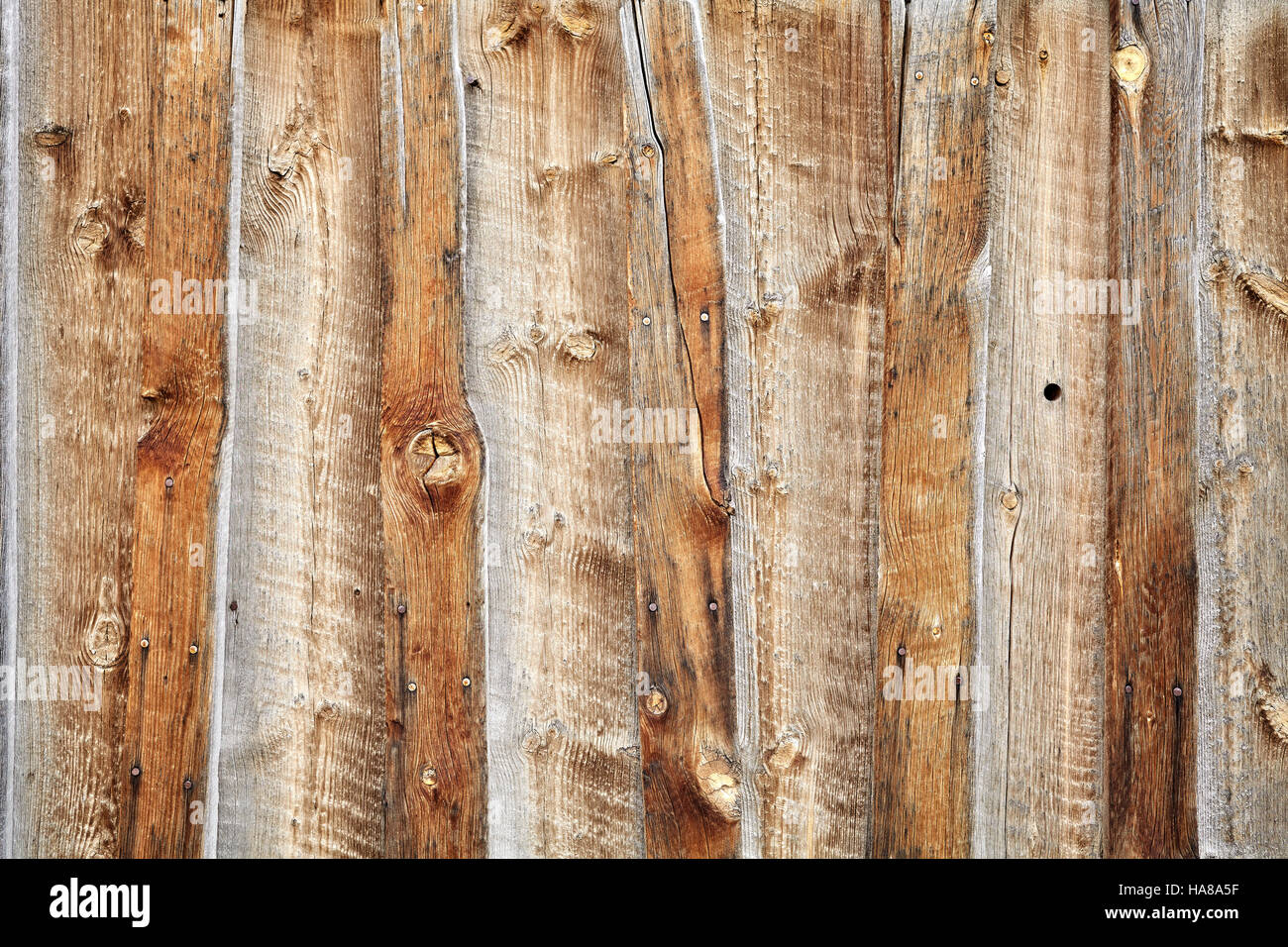 Foto der alten hölzernen Scheune Wand Hintergrund. Stockfoto