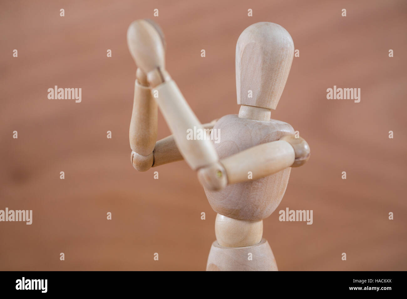 Holz Figur applaudieren Stockfoto