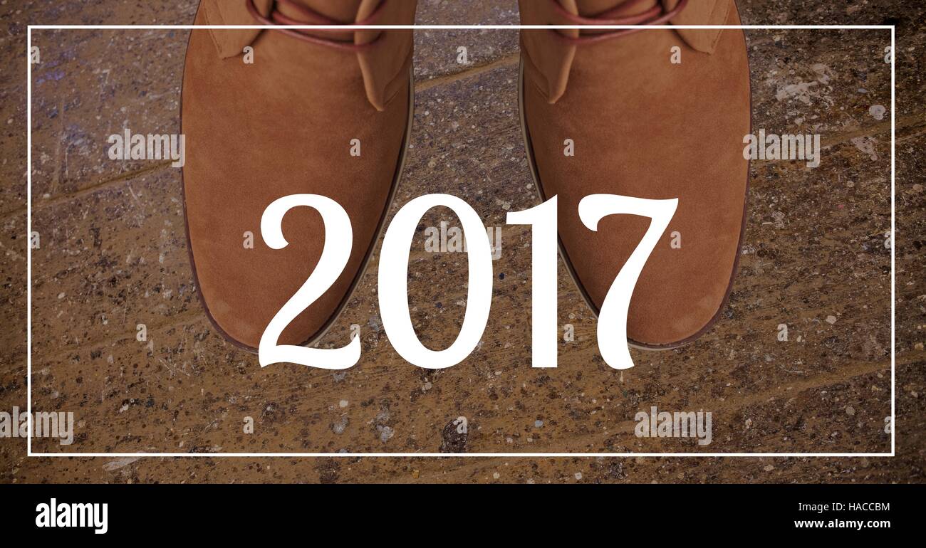 2017 Neujahrsbotschaft gegen braune Schuhe Stockfoto