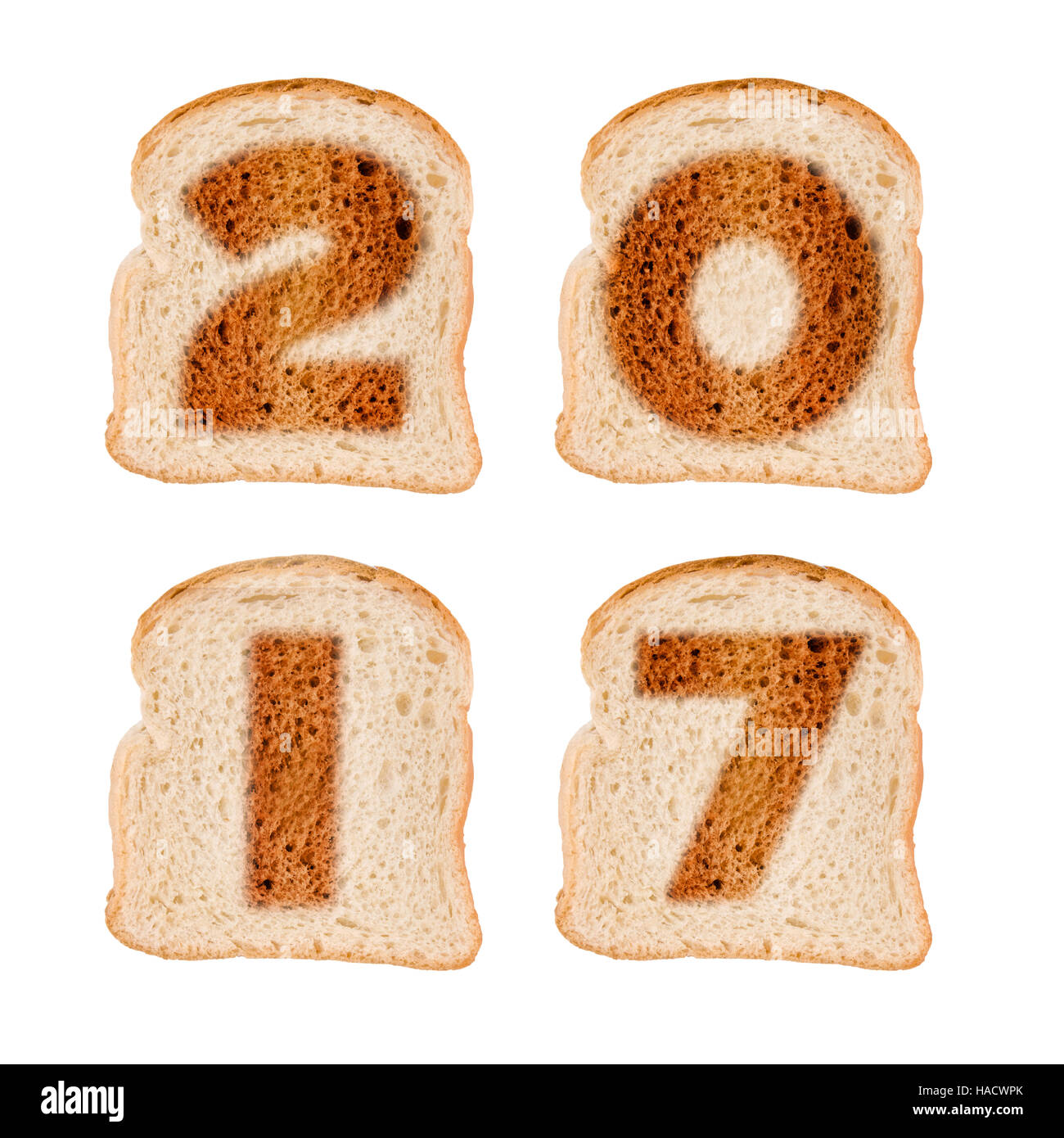 2017-Grußkarte auf gerösteten Brotscheiben Brot isolierten auf weißen Hintergrund Stockfoto