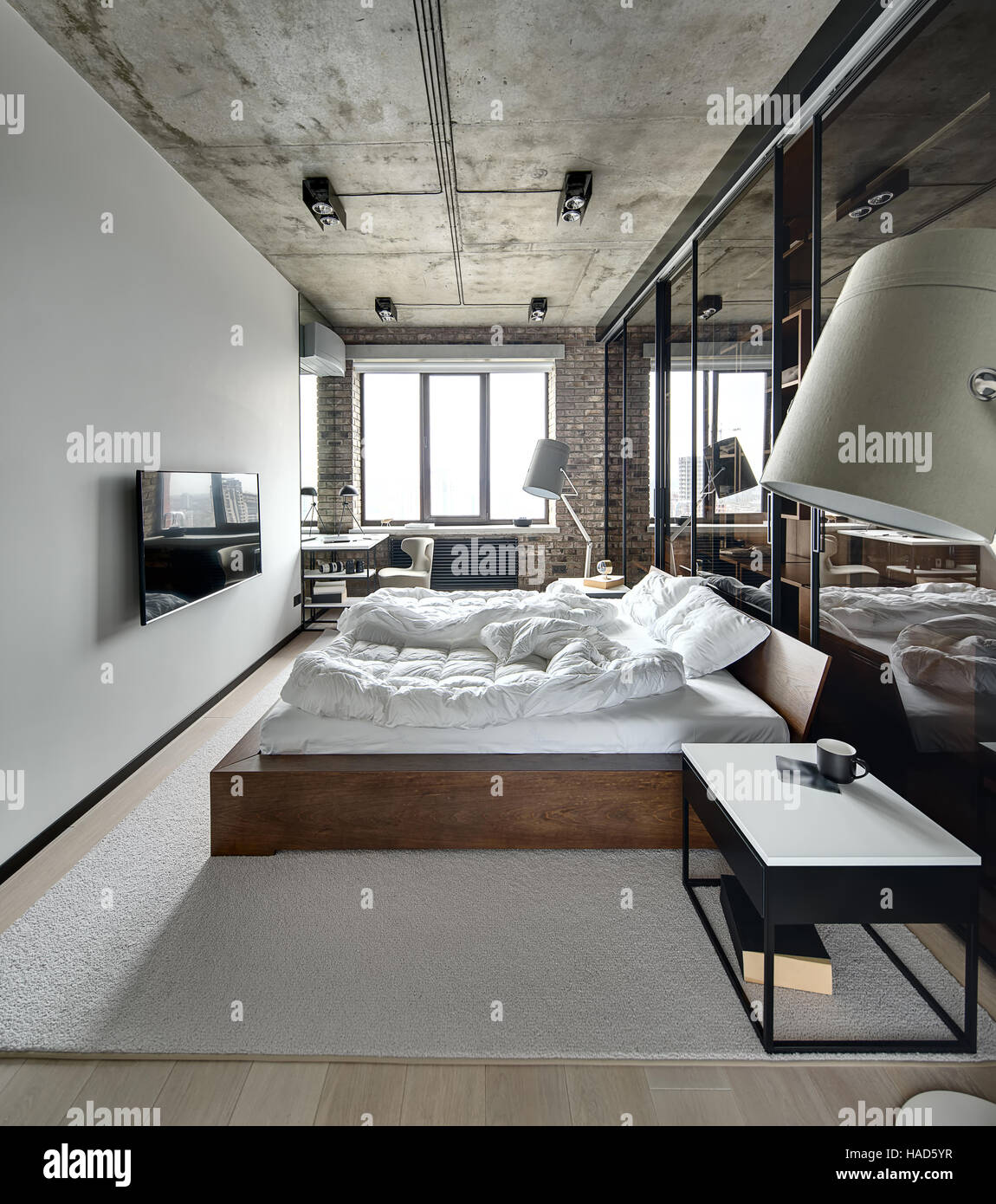 Loft-Stil-Schlafzimmer Stockfoto
